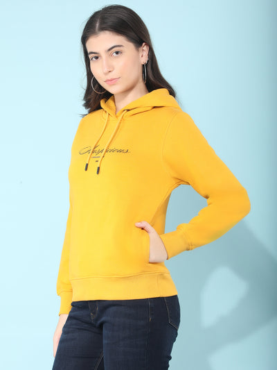 Mustard Typographic Print Hooded Sweatshirt-Women Sweatshirts-Crimsoune Club